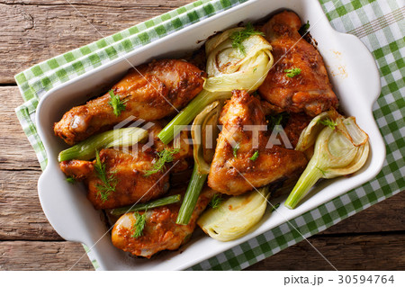 spicy chicken baked with fennel in orange juice spicy chicken baked with fennel in orange juice 30594764