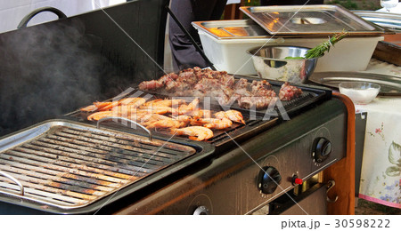 Grilled shrimps and meat. Grilled shrimps and meat. 30598222
