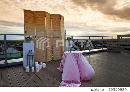 A wooden screen is on the background of the cloudy A wooden screen is on the background of the cloudy 30599920