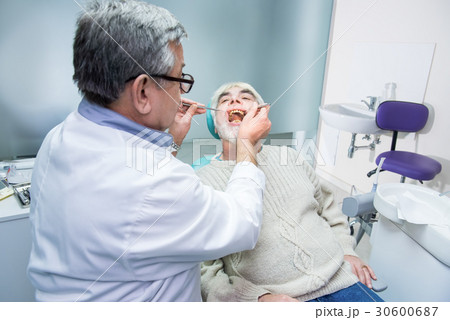 Senior male at the stomatologist. Senior male at the stomatologist. 30600687