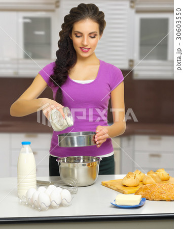 Cooking woman at kitchen Cooking woman at kitchen 30603550