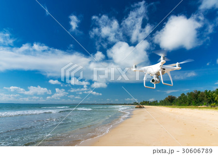 drone flying over sea. 30606789