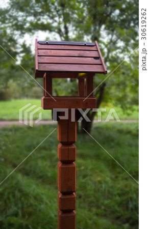 Wooden house for birds tits pigeons feeder Wooden house for birds tits pigeons feeder 30619262