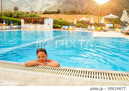 Girl in swimsuit swimming in pool, Bali, Crete 30624677