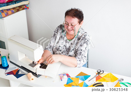 patchwork and quilting in the workshop of a tailor 30625348