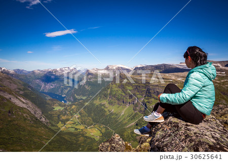 Geiranger fjord, Norway. Tourism vacation and traveling. Geiranger fjord, Norway. Tourism vacation and traveling. 30625641