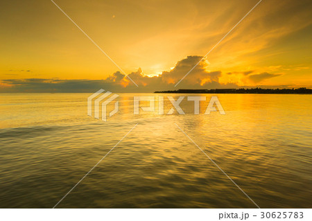 Beautiful sunrise over the tropical beach Beautiful sunrise over the tropical beach 30625783