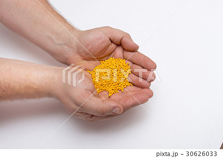 Polymeric dye in men's hands . Polymeric dye in men's hands . 30626033