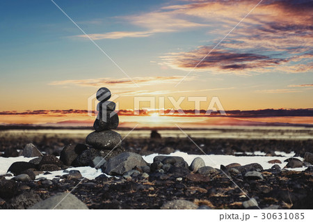 Balance stones, Zen stone stack, with blur sunset  30631085