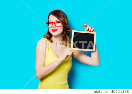 young woman with blackboard young woman with blackboard 30631388
