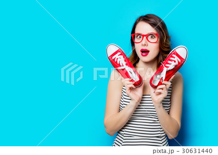 young woman with gumshoes 30631440