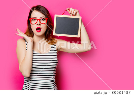 young woman with blackboard young woman with blackboard 30631487