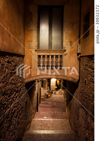Narrow Alley With Bridge In Girona Old Town 30632372