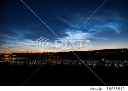 Noctilucent clouds at night sky Noctilucent clouds at night sky 30633912