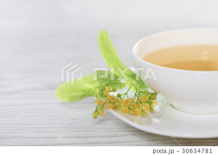 Cup with linden tea 30634781