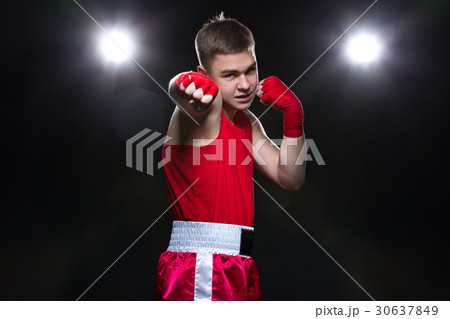 Young boxer in red form Young boxer in red form 30637849