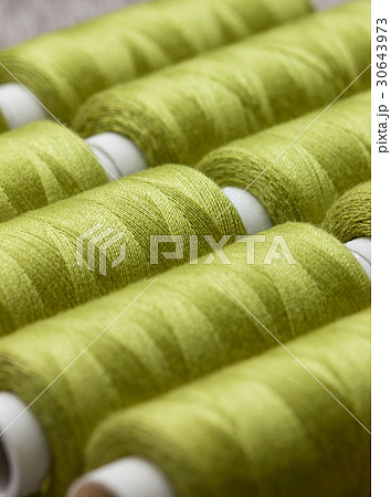 green spools of thread 30643973