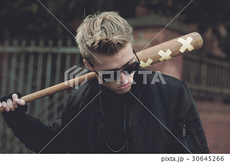 Young handsome blond haired hooligan with baseball Young handsome blond haired hooligan with baseball 30645266