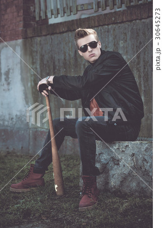 Hooligan with baseball bat and glasses Hooligan with baseball bat and glasses 30645273