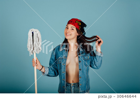 Beautiful sexy girl with a mop in hands 30646644