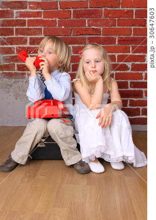 Blond boy and beautiful girl. Little couple Blond boy and beautiful girl. Little couple 30647603