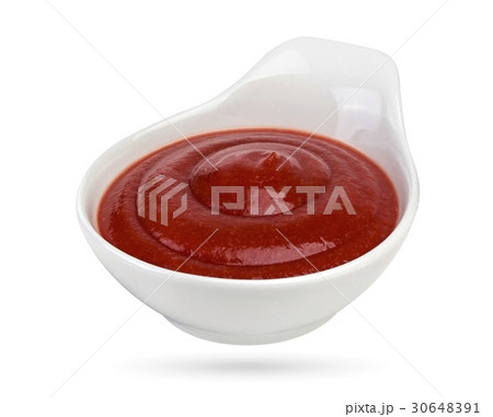 Ketchup in bowl isolated on white background.  30648391