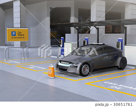 カーシェア専用駐車場に駐車している無人運転電気自動車。カーシェアリングのコンセプト 30651761