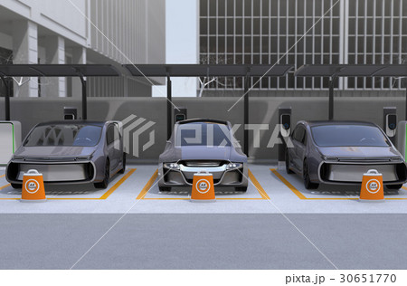 カーシェア専用駐車場に駐車している無人運転電気自動車。カーシェアリングのコンセプト 30651770