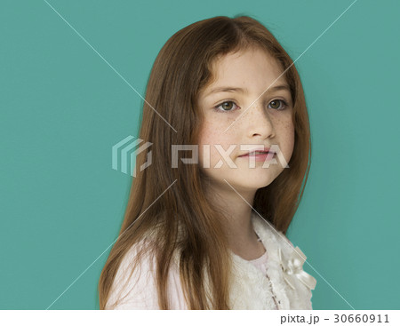 Young girl with a blank expression isolated portrait 30660911