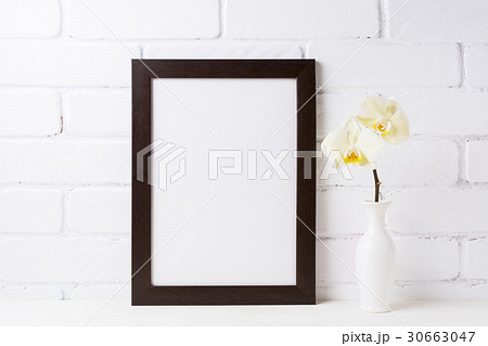 Black brown  frame mockup with soft yellow orchid  30663047