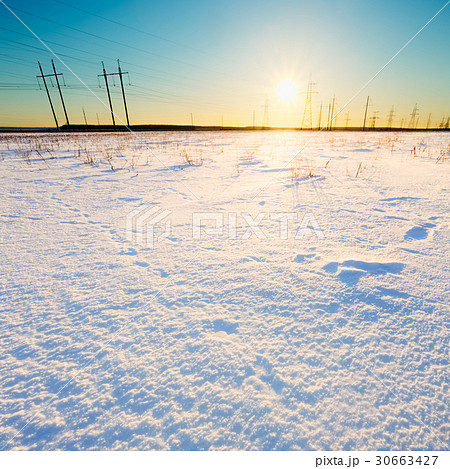 The field is covered with sunshine during sunset 30663427