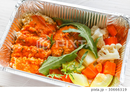 Healthy food in foil boxes, diet concept. Healthy food in foil boxes, diet concept. 30666319