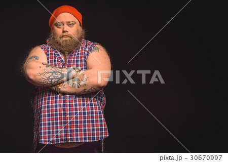 Stylish thick man posing in modern clothing 30670997
