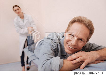 Mature man enjoying medical treatment Mature man enjoying medical treatment 30672431