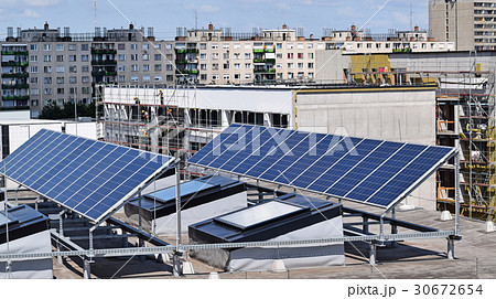 Solar panels on the top of a building 30672654