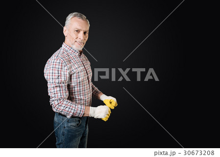 Portrait of positive man keeping arms bent in Portrait of positive man keeping arms bent in 30673208