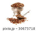 Flax seed on white background 30673718