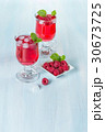 Alcohol cocktail with raspberries and mint 30673725
