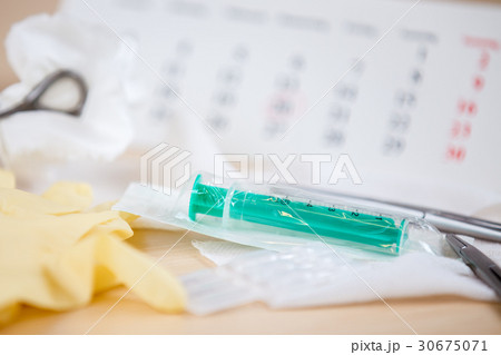 A table with medical instruments 30675071