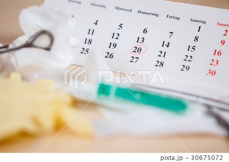 A table with medical instruments 30675072