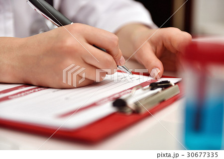 Woman Filling Medical History 30677335