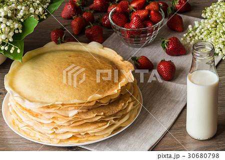 Delicious pancakes on wooden table with Delicious pancakes on wooden table with 30680798