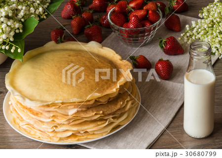 Delicious pancakes on wooden table with Delicious pancakes on wooden table with 30680799
