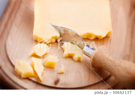 Parmesan cheese and knife Parmesan cheese and knife 30682137