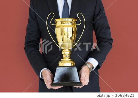 Business Man Holding Trophy Business Man Holding Trophy 30684923