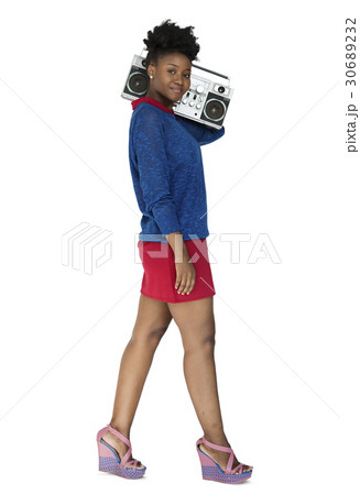 African Descent Woman Holding Jukebox 30689232