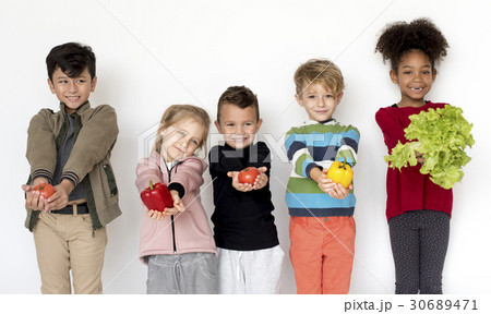Diverse group of kids standing in a row portrait Diverse group of kids standing in a row portrait 30689471