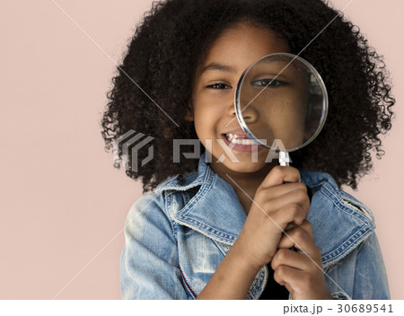 Little Girl Holding Magnifying Glass Smiling Little Girl Holding Magnifying Glass Smiling 30689541