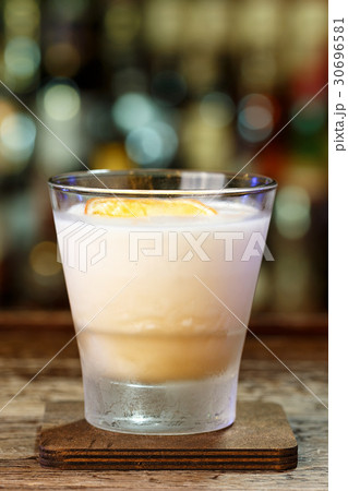 Refreshing whiskey sour cocktail 30696581