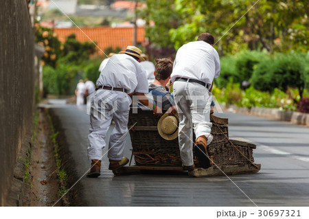 Toboggan riders on sledge - Madeira Portugal Toboggan riders on sledge - Madeira Portugal 30697321